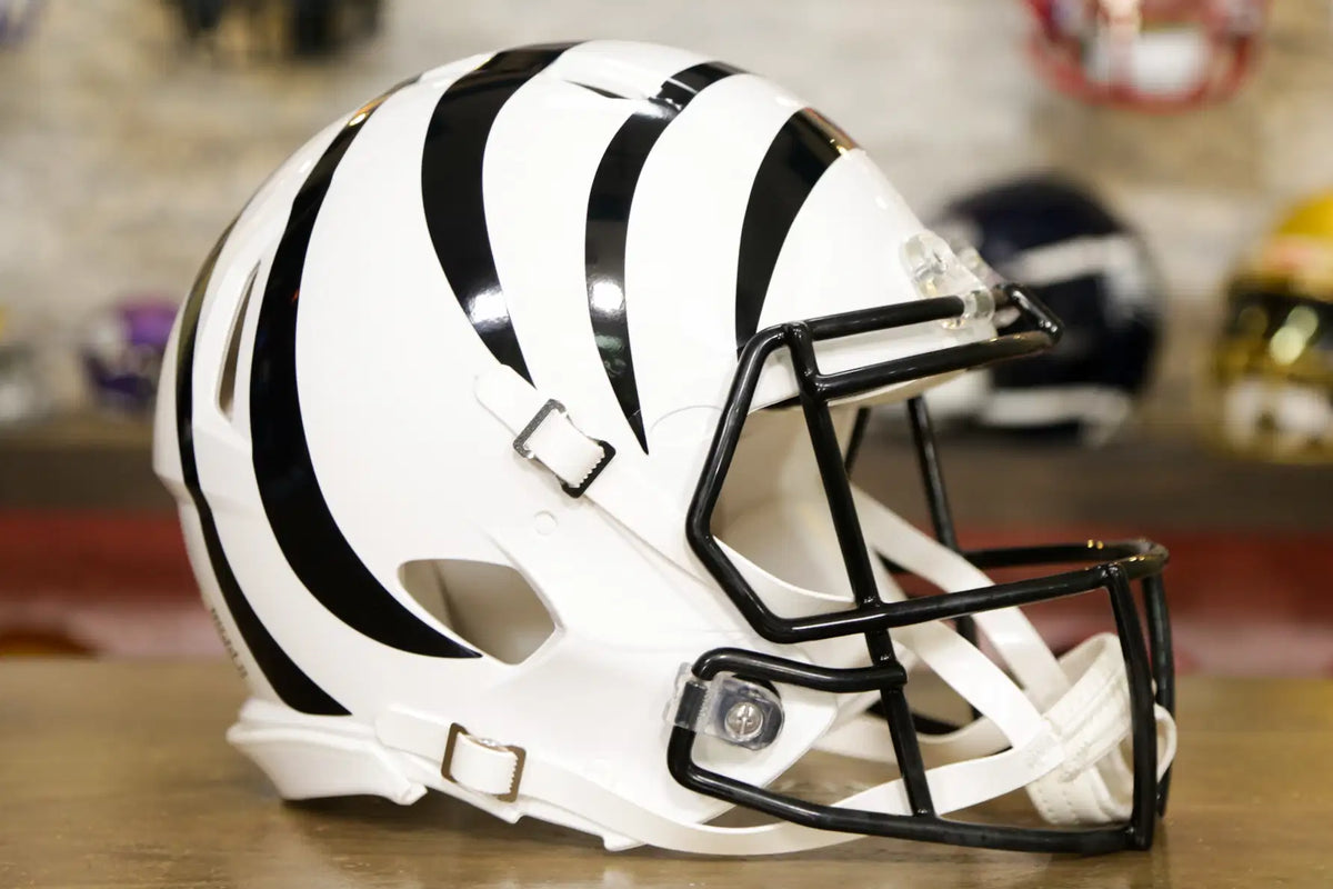 bengals football helmet on grass Cincinnati Bengals Riddell Speed Authentic Helmet