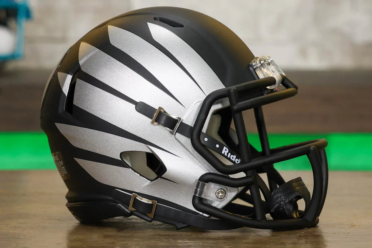 all oregon football helmets Ducks Black with Wings Revolution Speed Mini Helmet sized helmet Oregon Ducks football helmets throughout