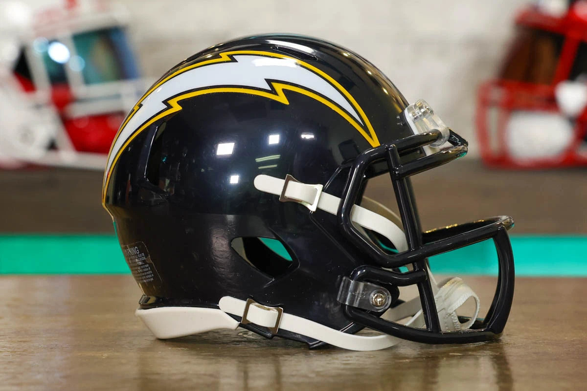 chargers youth football helmet Los Angeles Riddell Speed Mini while the team name is displayed on the left in a retro Riddell Los Angeles Chargers Retro