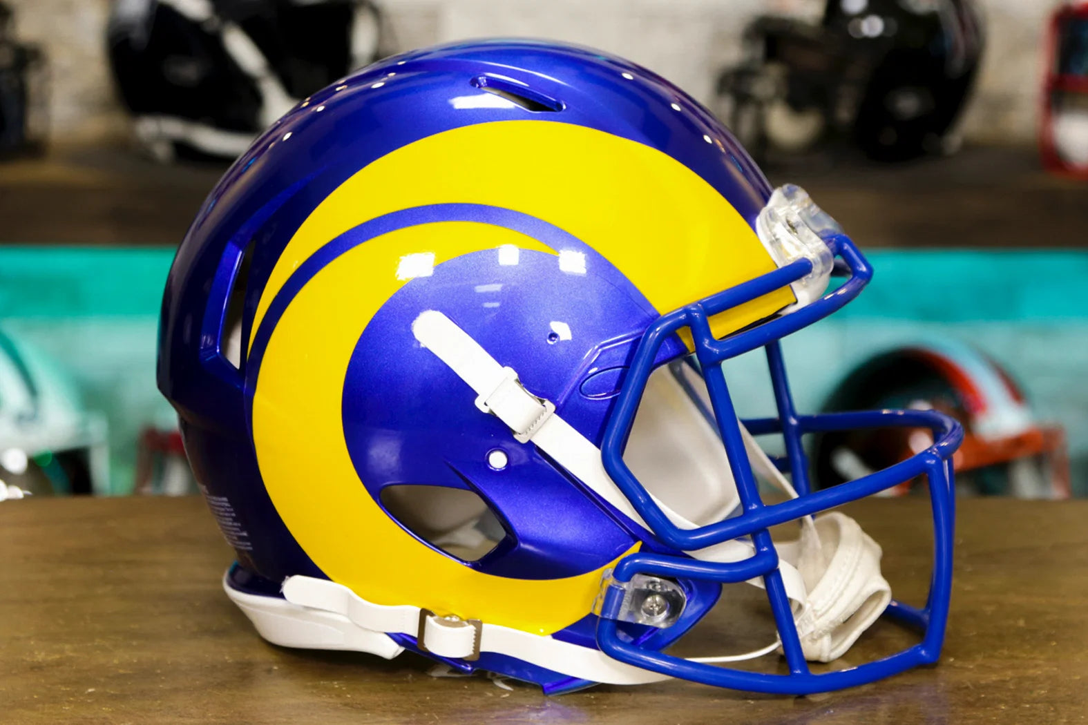 blue and yellow play football helmet Los Angeles Rams Riddell Speed Authentic Helmet